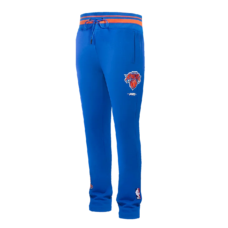 Varsity Jackets NBA NEW YORK KNICKS SCRIPT TAIL MEN'S RIB FLC SWEATPANT (ROYAL/ORANGE/ROYAL)